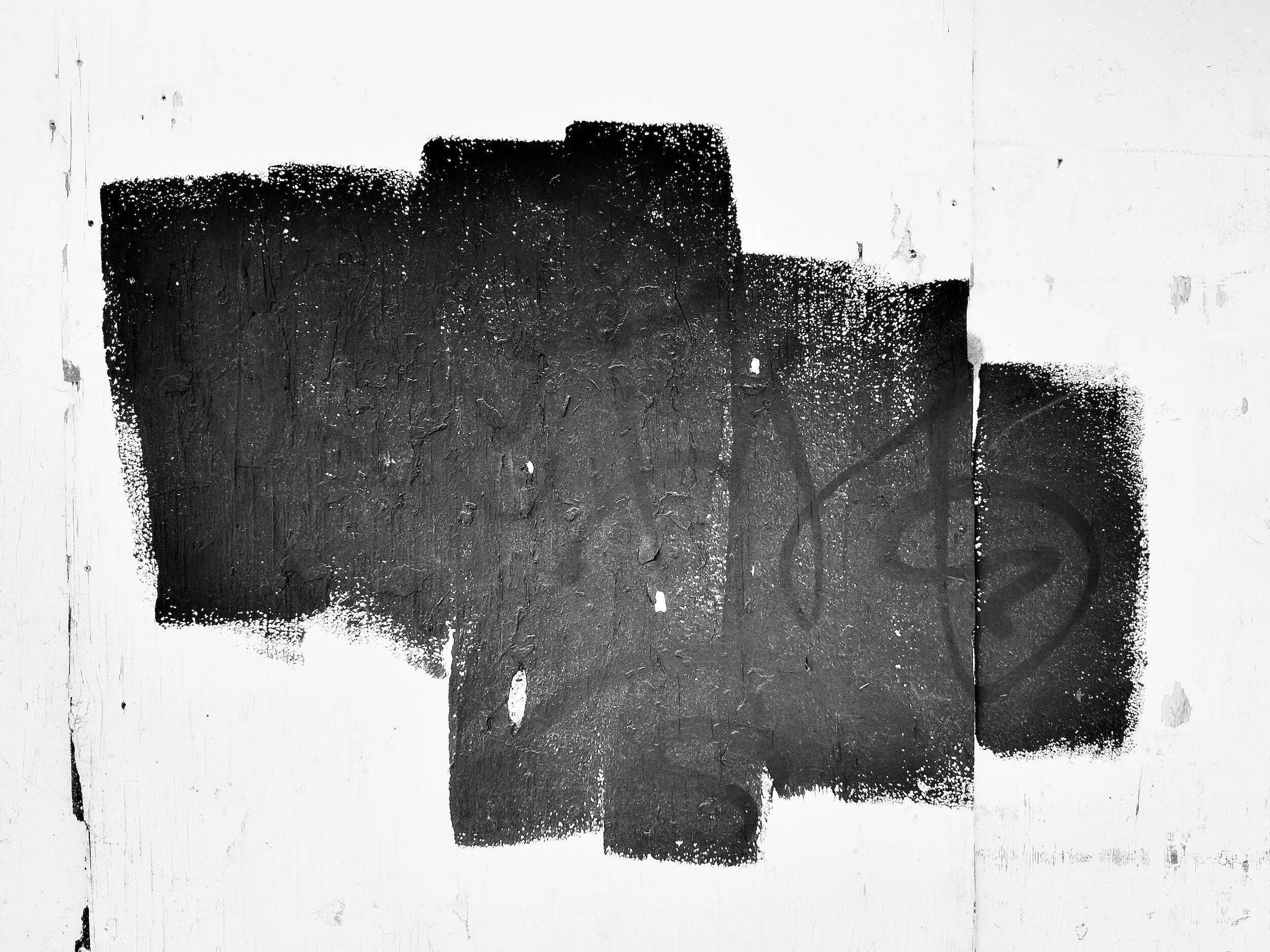 quartet lateral - glyph | LA - A photo featuring a monolithic black shape with rich surface texture. Industrial noir black-and-white photography, Los Angeles, California. 1/1 archival pigment print by Barton Caplan